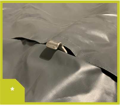 Ensure bed clasp clears roof cover